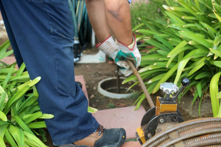 Using high pressure water hose to sweep up your yards easily